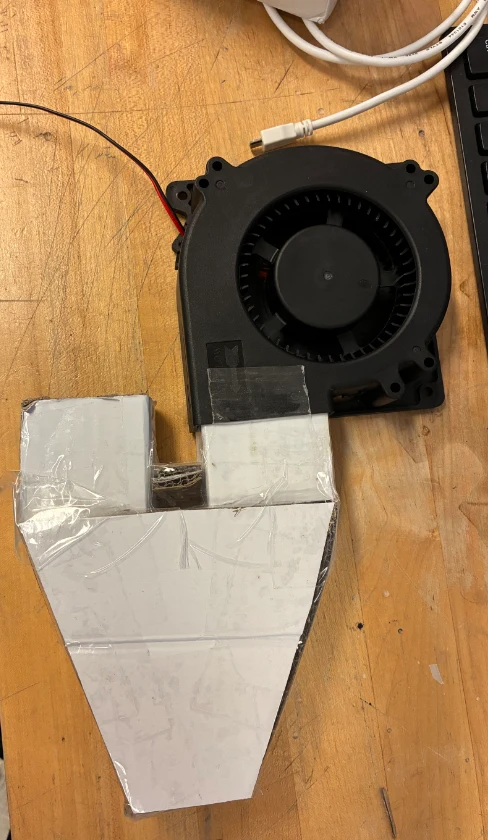 A later blower and nozzle assembly.